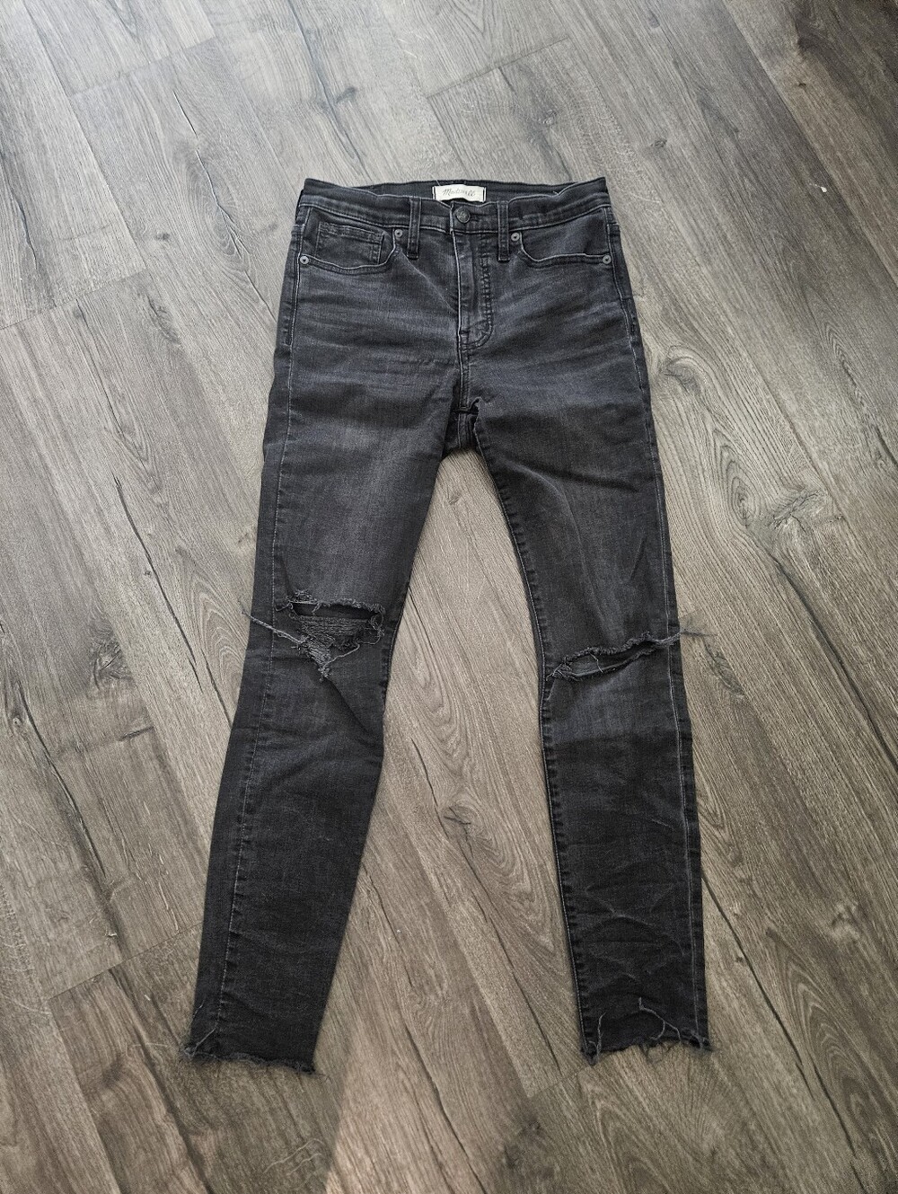 Madewell High-Rise Black Washed Skinny Jeans with Knee Rips